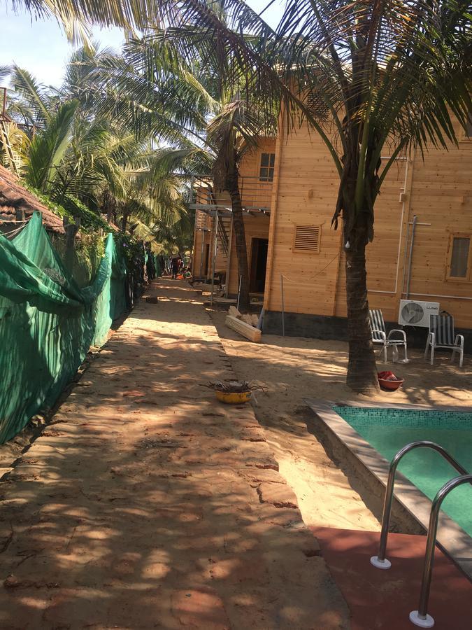 Tiara Fiesta Beach Cottages Morjim Extérieur photo